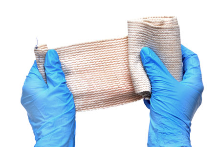nurse hands holding a medical bandage