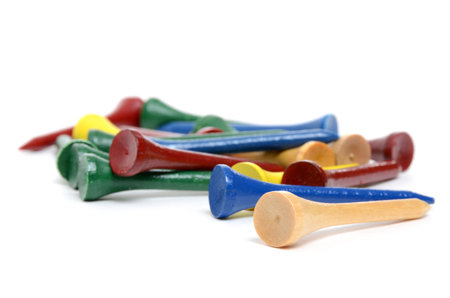 colorful golf tees isolated on white background