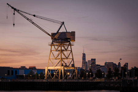 old port crane against the background of skyscrapers of Manhattan. High-quality photo