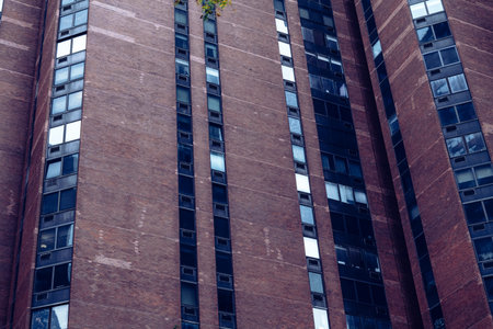 Red Brick residential buildings in New York City at Cloudy weather, USA. High-quality photo