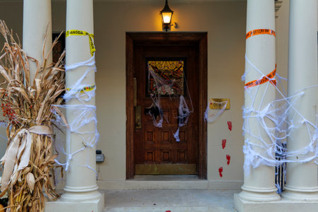 Colorful Pumpkins and Flowers on the Stairs of an Old Brownstone Home in New York City during Autumn. High quality photoの写真素材
