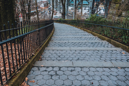 Looking Down the tree-lined St. Clair Stairs in Riverside Park, New York City. High-quality photo