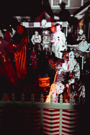 Creepy Halloween Clown Scene with Kissing Booth and Carnival Setup. High quality photoの写真素材