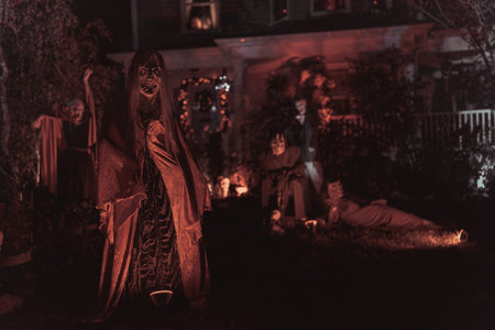 Spooky Halloween Yard Display with Skeletons, Pumpkins, and Haunted Figures. High quality photoの写真素材