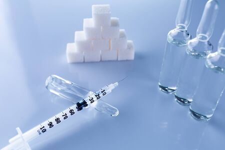 Diabetes,insulin,high blood sugar,hyperglycemia. Ampoules, vials, syringe. Medical injection,diseases,health care. Medical background with copy space Diabetes World Dayの写真素材