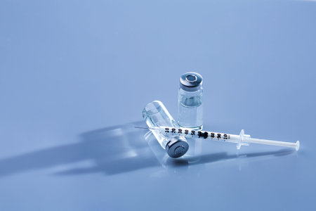 Ampoules, vials, syringe. Medical injection,diseases,health care,diabetes,insulin. Syringe with...