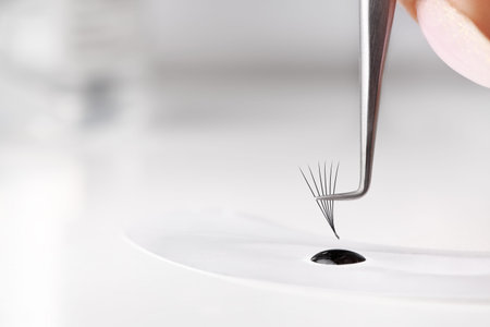 Eyelash extension tools. Fake eyelashes. Accessories for eyelash extensions. Drop of eyelash glue...