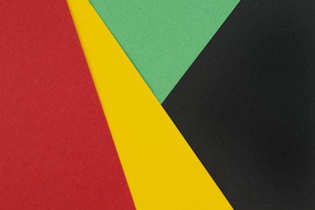 February Black History Month. Abstract Paper geometric black, red, yellow, green background. Copy space, place for your text. Top view.の写真素材