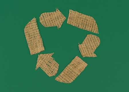 Turmeric latte with cinnamon sticks and anise herb on light-yellow background. Immunity boosters concept. Alternative coffee. Golden milk.の写真素材