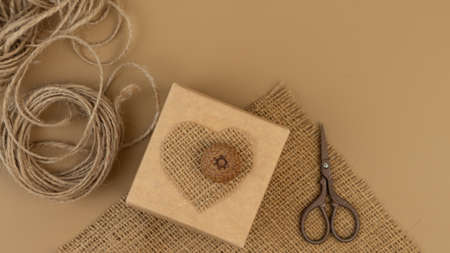 Turmeric latte with cinnamon sticks and anise herb on light-yellow background. Immunity boosters concept. Alternative coffee. Golden milk.の写真素材