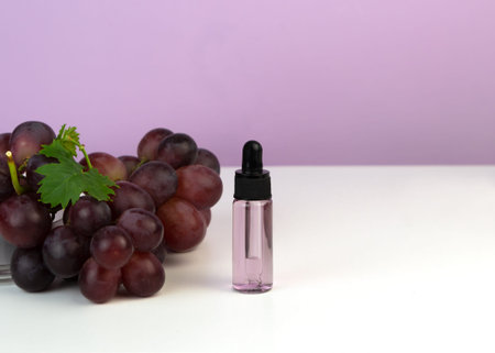 Organic bio grape cosmetics. Extract, grape seed oils, serum. Abstract cosmetic laboratory.の写真素材