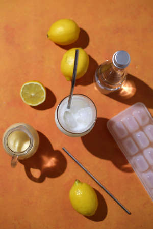 Creamy lemonade trendy summer mocktail. Cold non-alcoholic cocktail with lemon juice and sweetened condensed milk.の写真素材