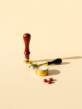 Wax printing with fire paint on homemade kraft paper with pressed dried flowers. Sealing wax seal kit.の写真素材