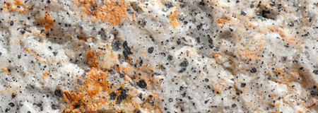 Close-up of granite texture, revealing the speckled pattern and color diversity for a durable look.の素材