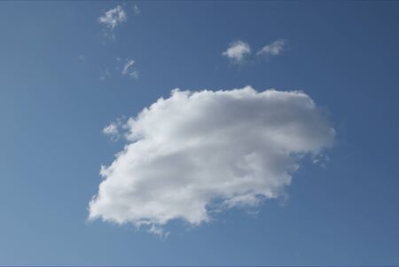 White, spring little cloud in the blue sky.の写真素材