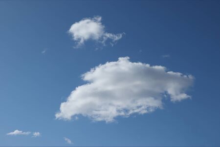 White, spring little cloud in the blue sky.の写真素材