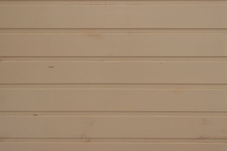 Beige painted wood planed panel, background imageの写真素材