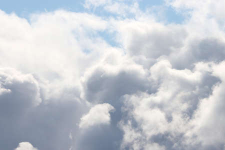 Clouds illuminated by the sun during a thunderstorm.の写真素材