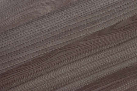 Background, dark wood. Smooth surface texture of treated maple.の写真素材