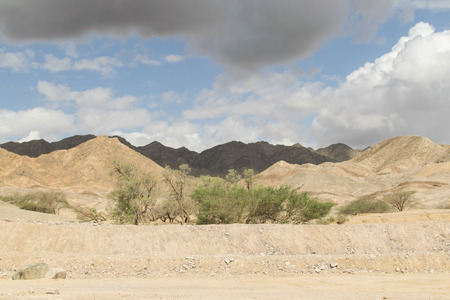 Magnificent landscape - a view of the mountains of Eilat for a minute before the rainの写真素材