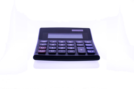 Black calculator on white backgroundの写真素材