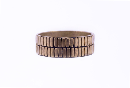 Beautiful bracelet made of wood and copper, on a white backgroundの写真素材