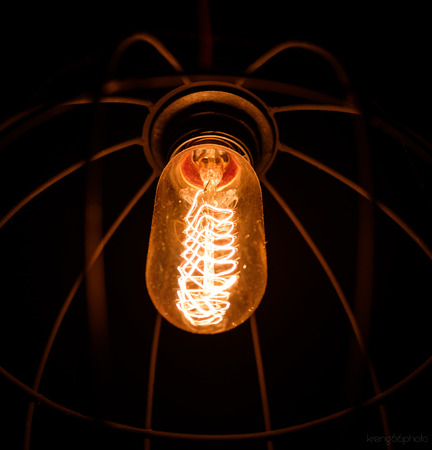the light bulb in the darknessの写真素材