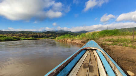 Boats in lake with water in background in morning,の写真素材