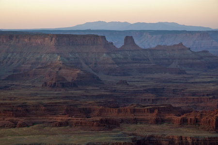 The sunrises on the canyons carved by the Colorado River viewed from Dead Horse Point State Park, Moab, Utah.の写真素材