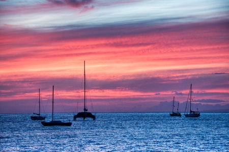 Moored sailboats under a colorful Lahaina, Maui, Hawaii sunset の写真素材