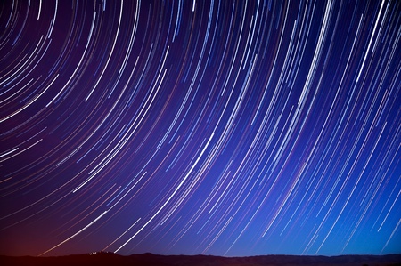 Star and auto light trails above Mt  Hamilton in San Jose, California の写真素材