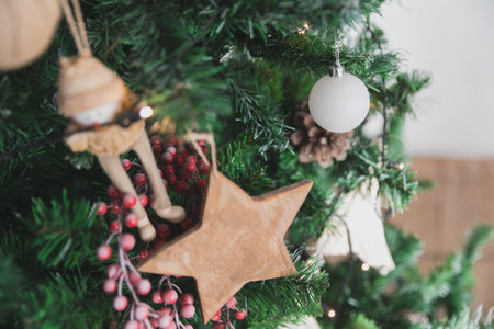 Decorated Christmas tree on blurred, sparkling and fairy backgroundの写真素材