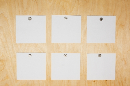 board on which thumbtacks pinned clean stickersの写真素材