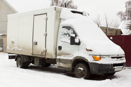car snowbound in winterの写真素材