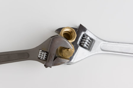 wrenches with land water pipe on a white background