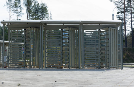 the turnstile is located on the sidewalk and prevents pass to a special place