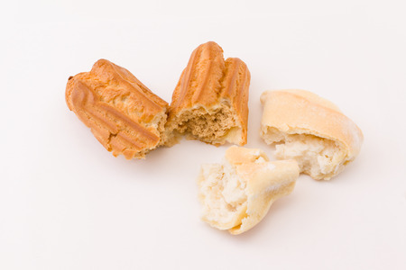 tasty cakes lie on a white background and wait for the buyerの写真素材