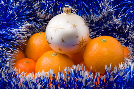 hill surrounded by tangerine blue garland and ornaments Christmas toysの写真素材
