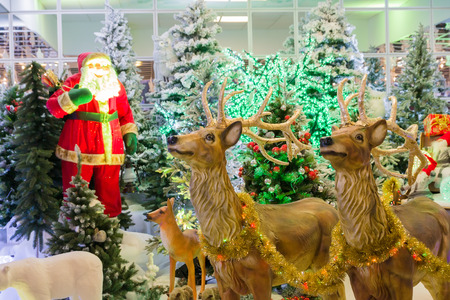 hall of the building is decorated with Christmas decorations with Santa and reindeerの写真素材