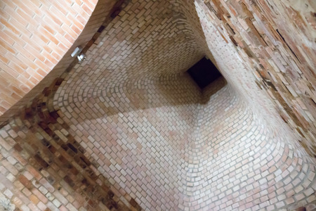 view of a huge brick flue from withinの写真素材
