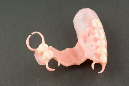 large image of a modern denture on a black background