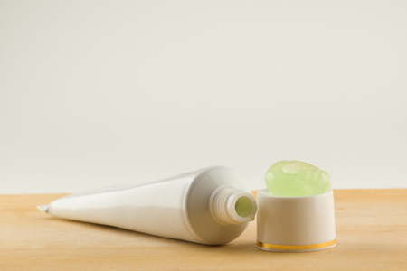 White medical cream in a close-up containerの写真素材