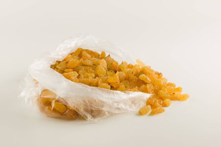 Fresh picked raisins isolated on white background and ready to eatの写真素材