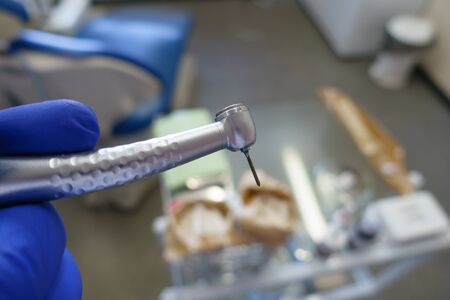 Close up  dental equipment, dental instruments, dental unit tips in dental clinic. Tools for cleaning teeth and oral health.の写真素材