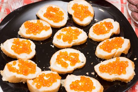 delicious fresh dishes are exhibited on the festive tableの写真素材