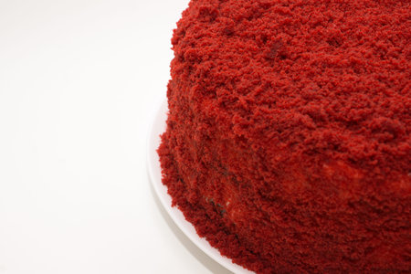bright red cake called red velvet isolated on a white background