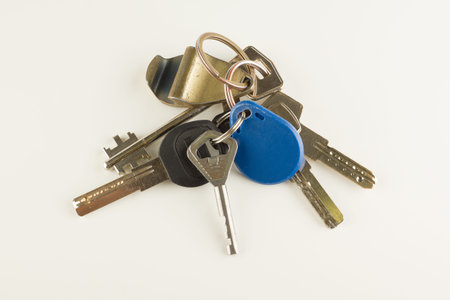 large bunch of different keys isolated on a white background