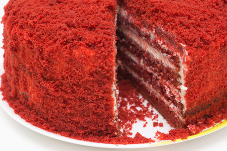 bright red cake called red velvet isolated on a white background