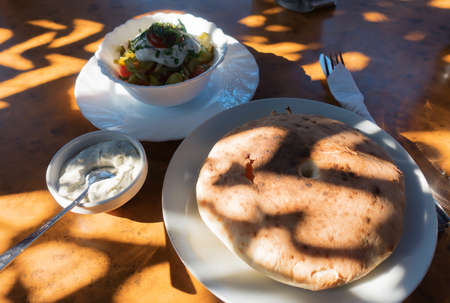 tasty snacks on a white plate in the openの写真素材