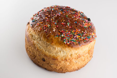 round fragrant Easter bun with colored sprinkles